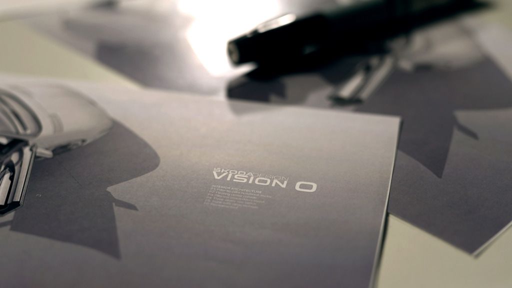 Nahaufnahme eines Broschüren-Covers mit der Aufschrift "VISION O". Im Hintergrund liegt ein Stift und weitere Dokumente. Das Design der Broschüre zeigt ein stilisiertes Fahrzeug.